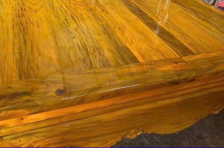Wood surface finished with glossy alkyd varnish